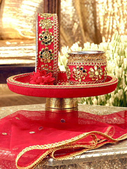 Sitara red Karwa Chauth pooja hamper displayed as a coordinated handcrafted set