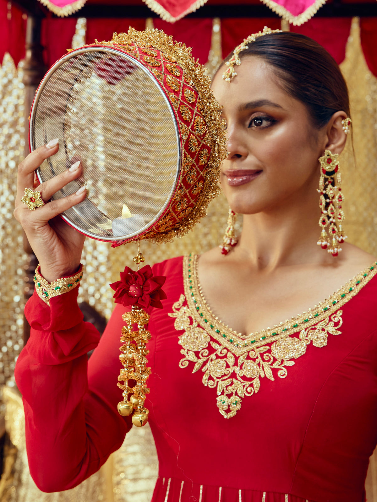Chamak red Karwa Chauth channi with intricate gota work and festive gold accents