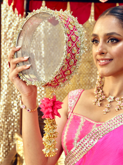 Chamak rani pink Karwa Chauth channi with handcrafted gota work, floral tassel and gold-toned details