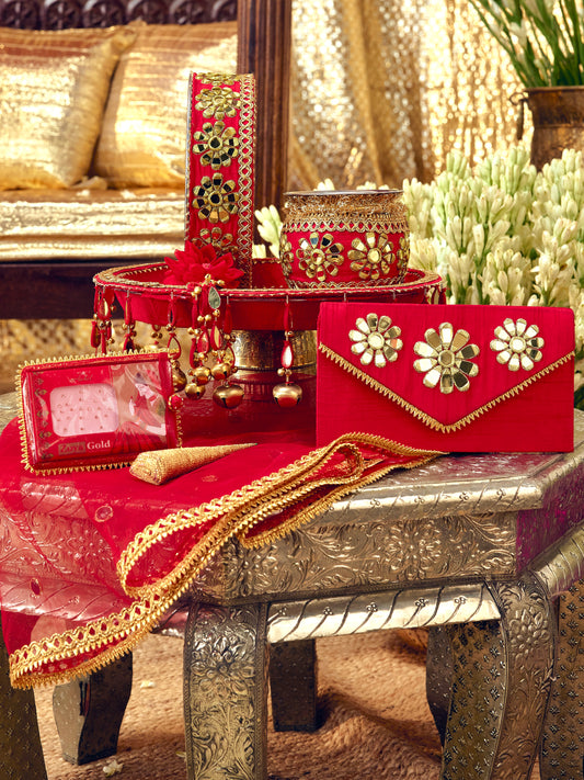 Sitara red Karwa Chauth pooja hamper displayed as a coordinated handcrafted set