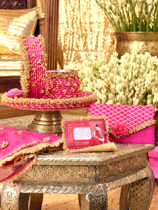 Tota Maina rani pink Karwa Chauth pooja hamper displayed as a coordinated handcrafted set