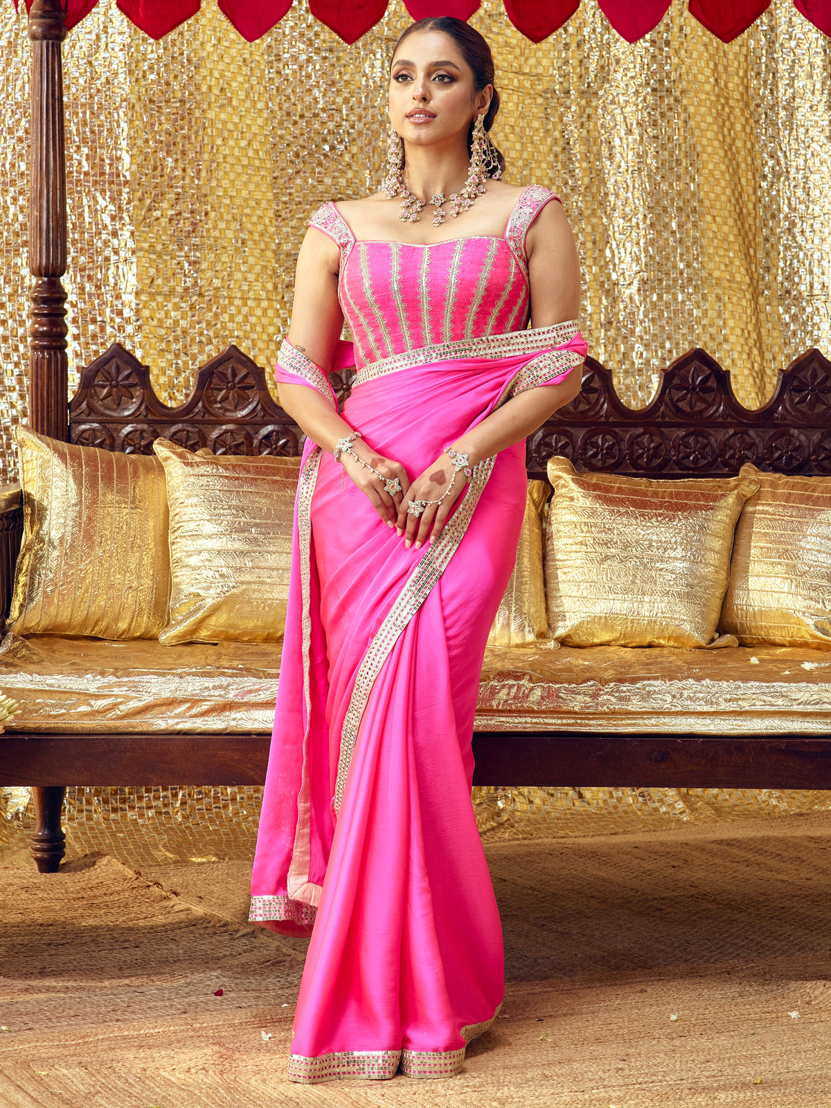 Model wearing the Gulaab hot pink saree set with handcrafted festive embroidery