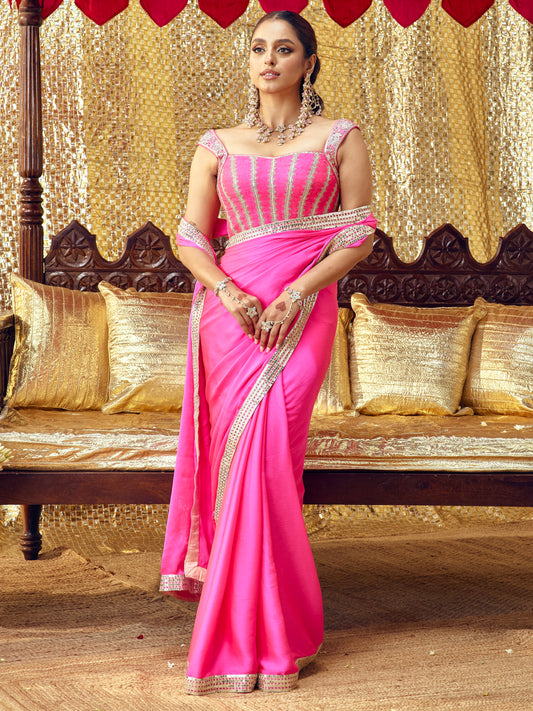 Model wearing the Gulaab hot pink saree set with handcrafted festive embroidery