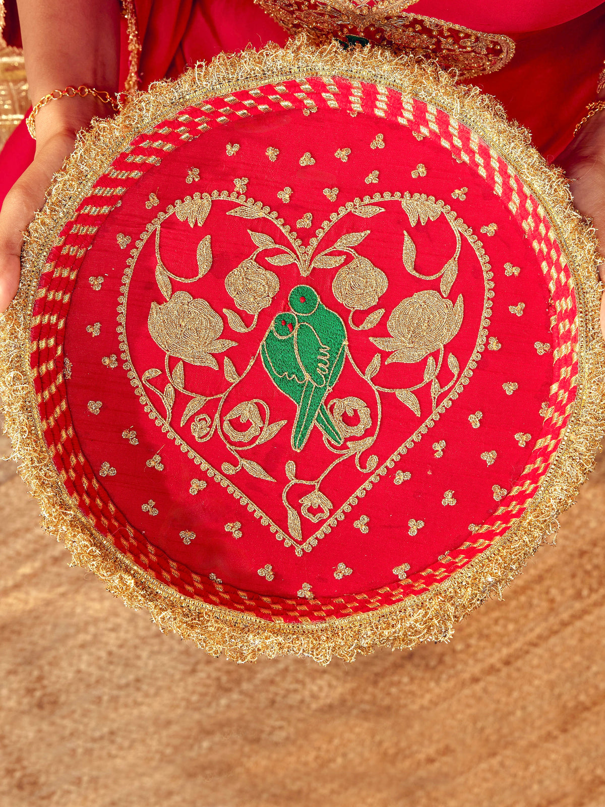 Tota Maina red Karwa Chauth thal with dori embroidery and romantic bird-and-floral motifs