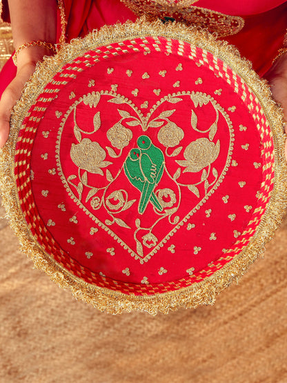 Tota Maina red Karwa Chauth thal with dori embroidery and romantic bird-and-floral motifs