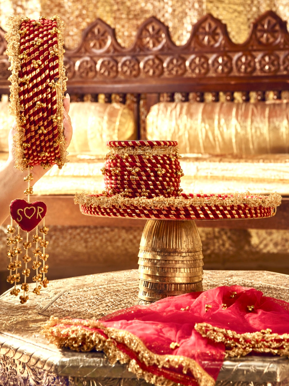 Kumkum maroon Karwa Chauth pooja hamper displayed as a coordinated handcrafted set