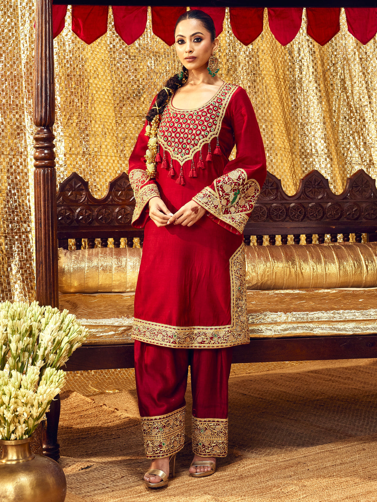 Model wearing the Tota Maina maroon farshi salwar set with handcrafted festive embroidery