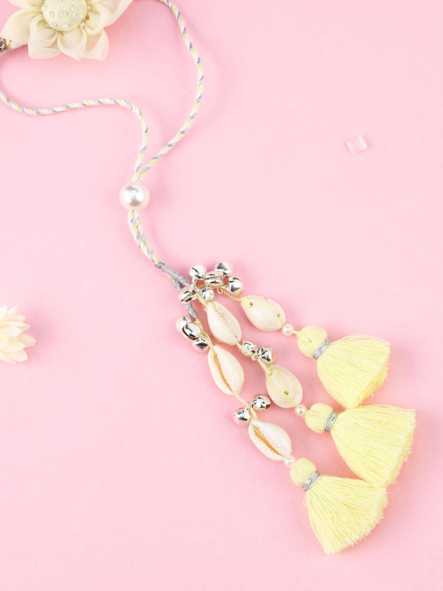 Floral Cowrie Yellow Lumba Rakhi