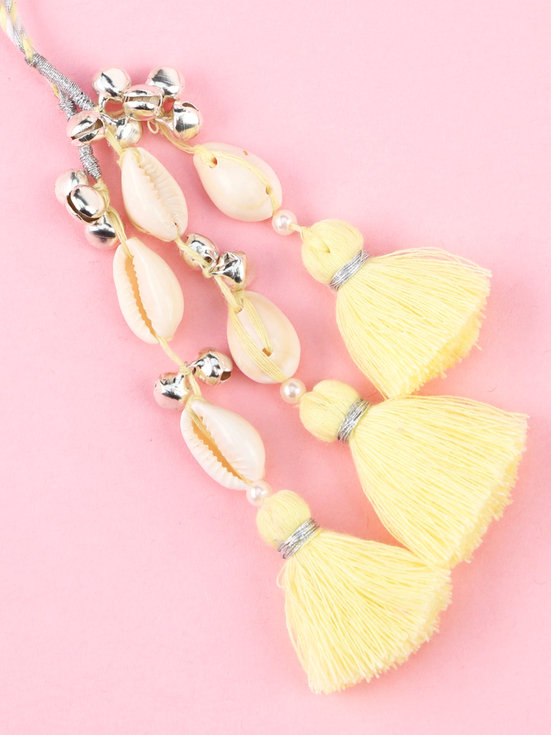 Handmade Floral Cowrie Yellow Lumba for Raksha Bandhan gifting