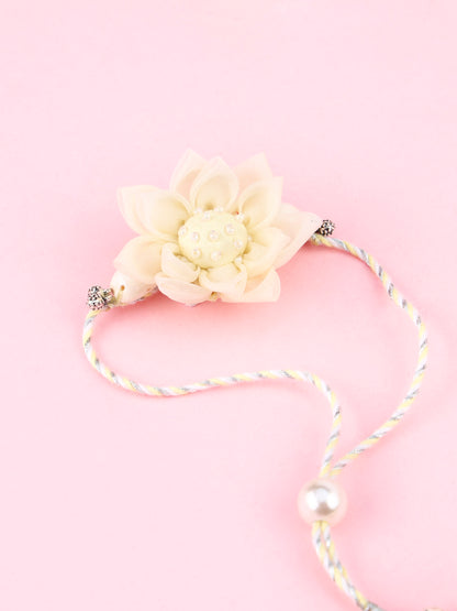 Handmade Floral Cowrie Yellow Lumba for Raksha Bandhan gifting