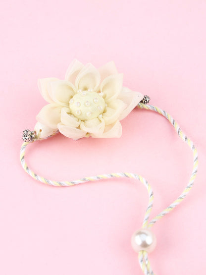 Floral Cowrie Yellow Lumba Rakhi
