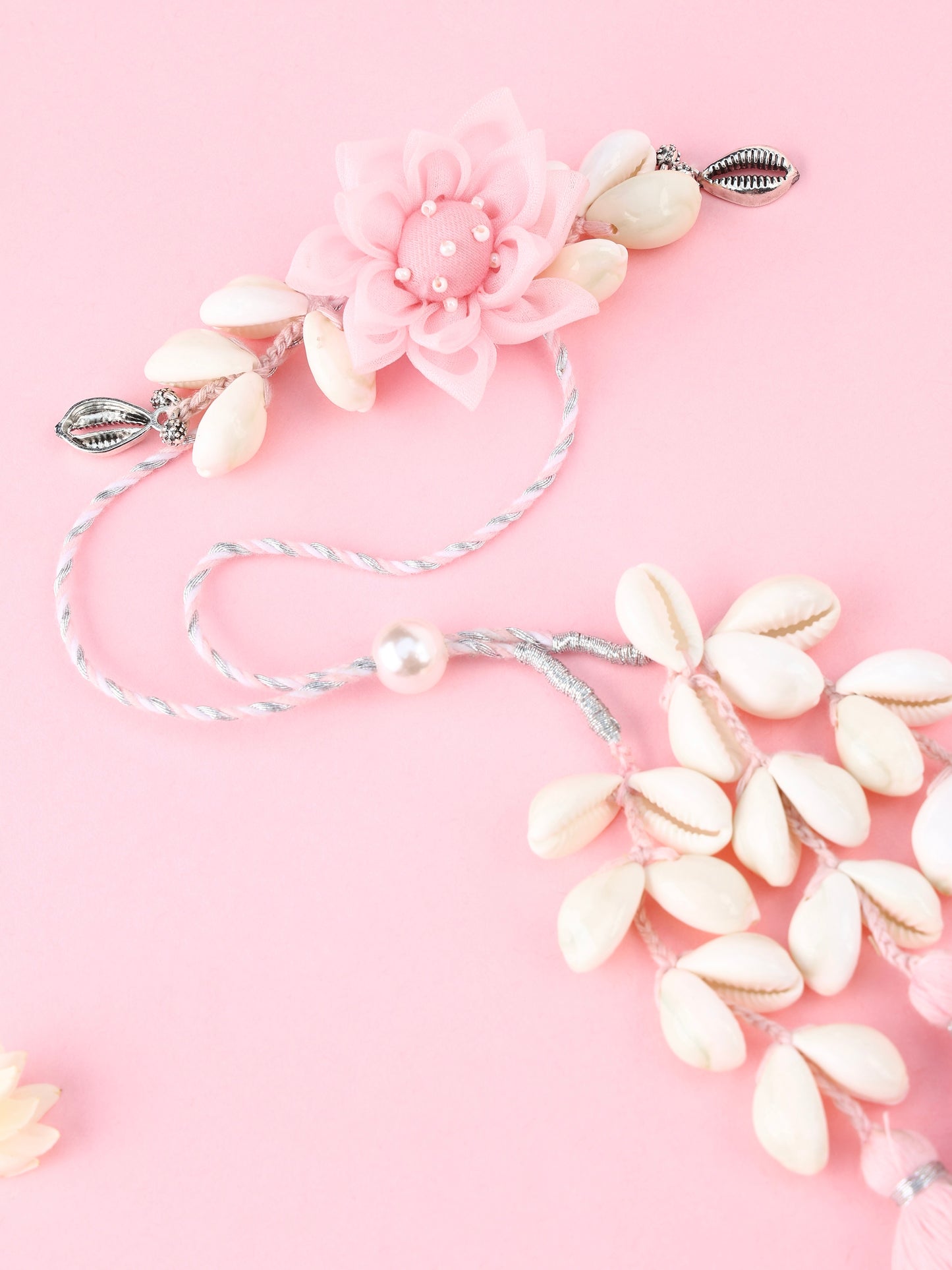 Handmade Floral Cowrie Pink Lumba for Raksha Bandhan gifting