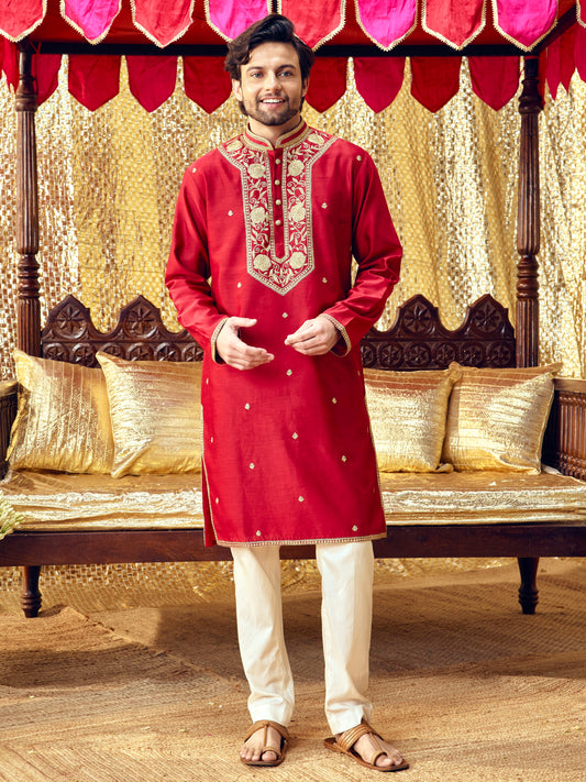 Model wearing the Gulaab red kurta set with handcrafted festive embroidery