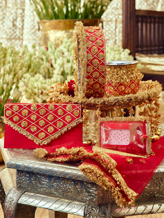 Chamak red Karwa Chauth pooja hamper displayed as a coordinated handcrafted set