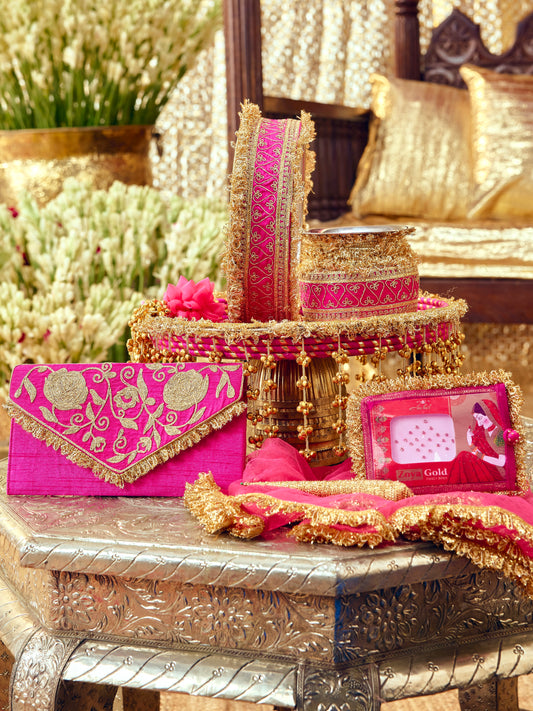 Tota Maina rani pink Karwa Chauth pooja hamper displayed as a coordinated handcrafted set