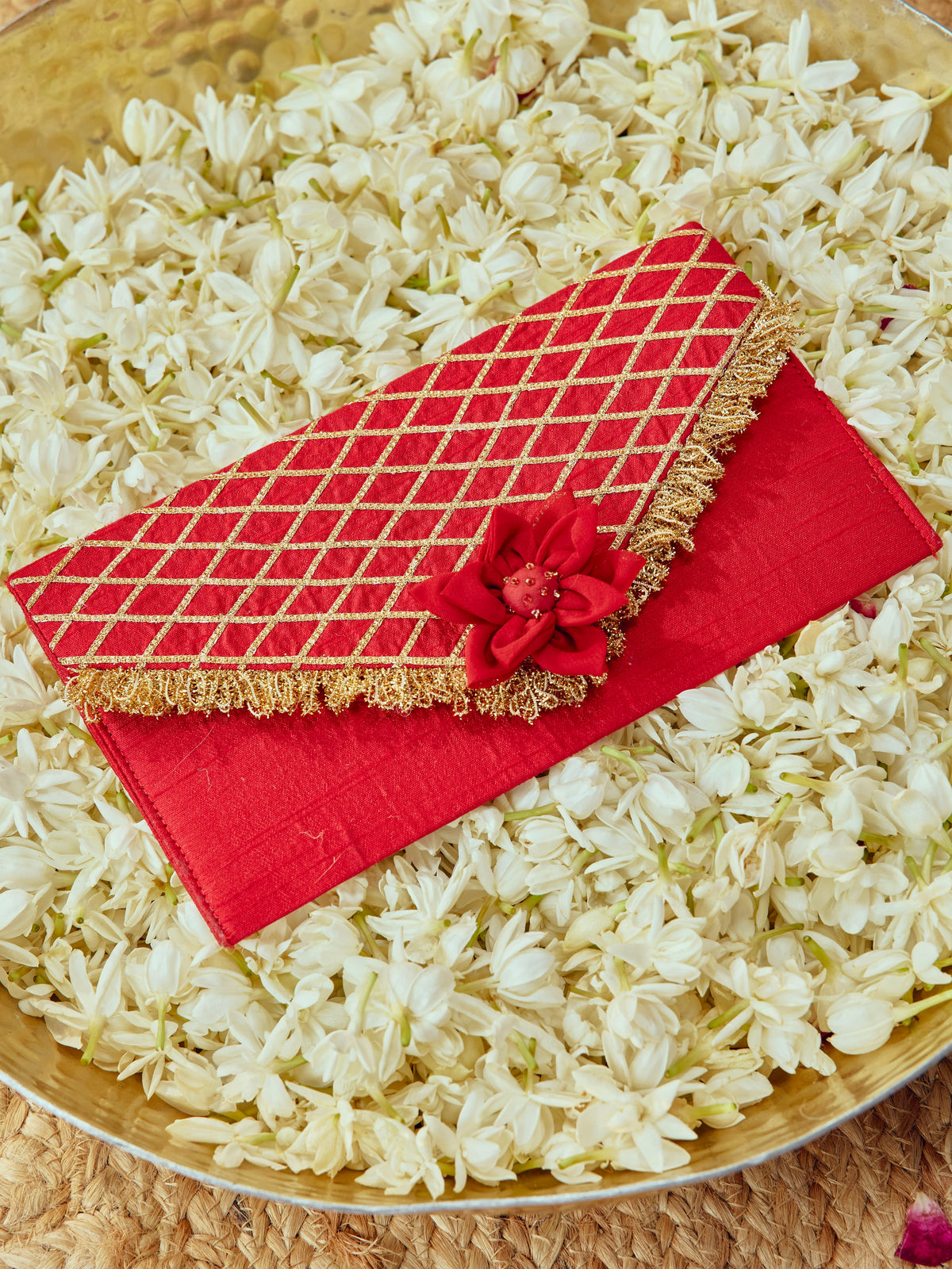 Kumkum red Karwa Chauth envelope with thread gota dori and delicate ghungroo details