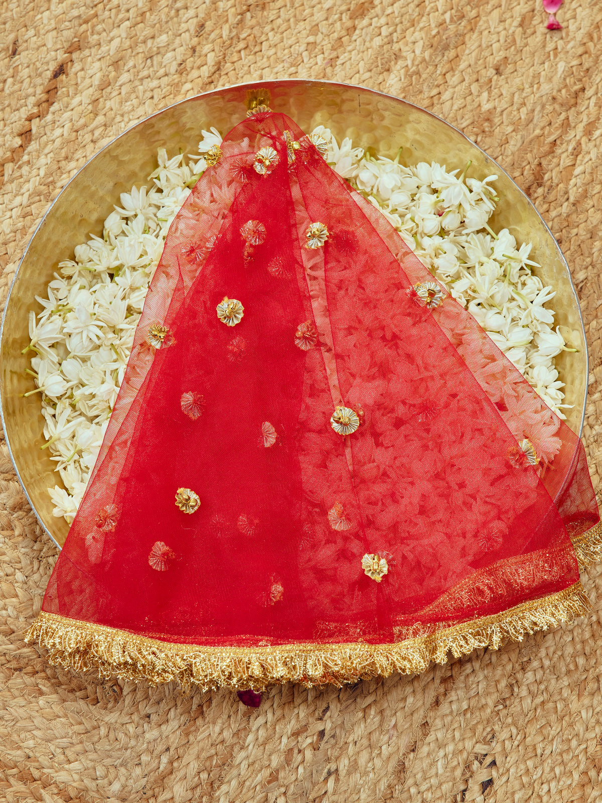 Chamak red Karwa Chauth chunri with intricate gota work and festive gold accents