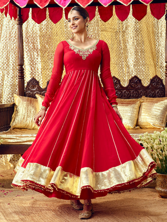 Model wearing the Gulaab red anarkali set with handcrafted festive embroidery