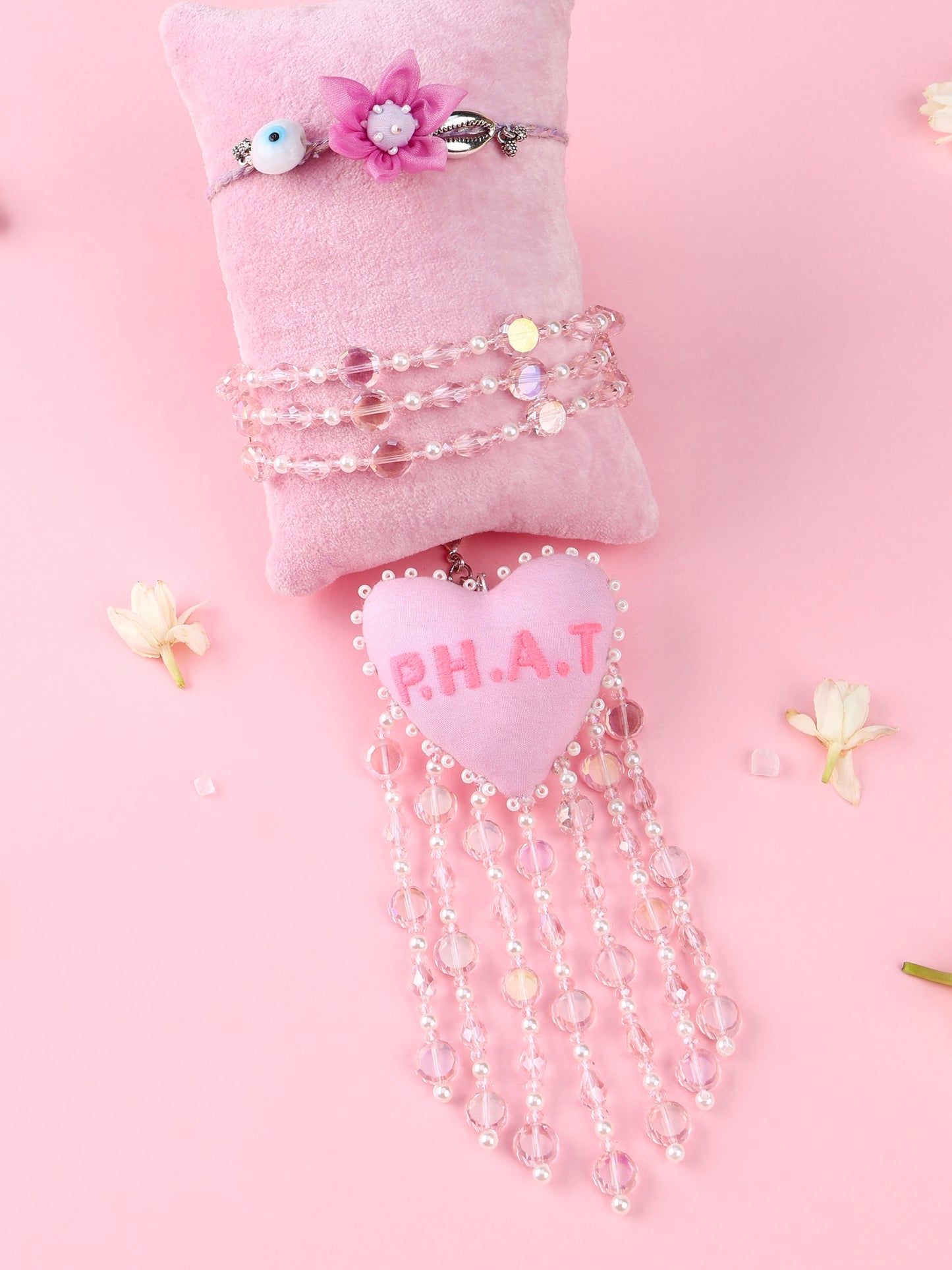 Floral Lilac Evil Eye Rakhi and P.H.A.T Lumba - Bhai Bhabhi Rakhi Set  by Tonoto