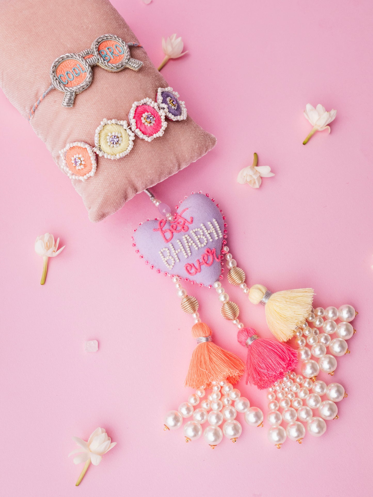 Describe cool bro rakhi and best bhabhi ever lumba combo with tassel and pearl detail