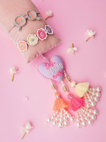 Describe cool bro rakhi and best bhabhi ever lumba combo with tassel and pearl detail