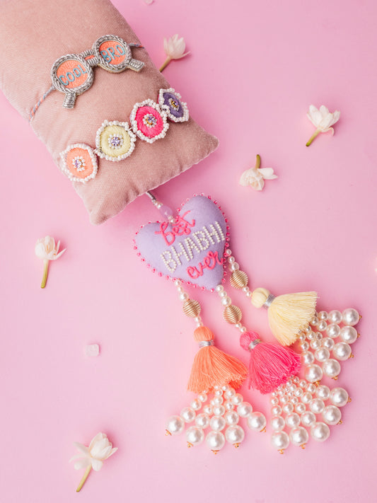 Describe cool bro rakhi and best bhabhi ever lumba combo with tassel and pearl detail