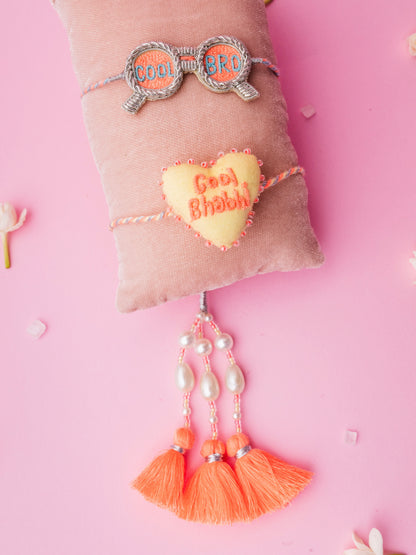 Describe cool bro rakhi and cool bhabhi  lumba combo with tassel and pearl detail