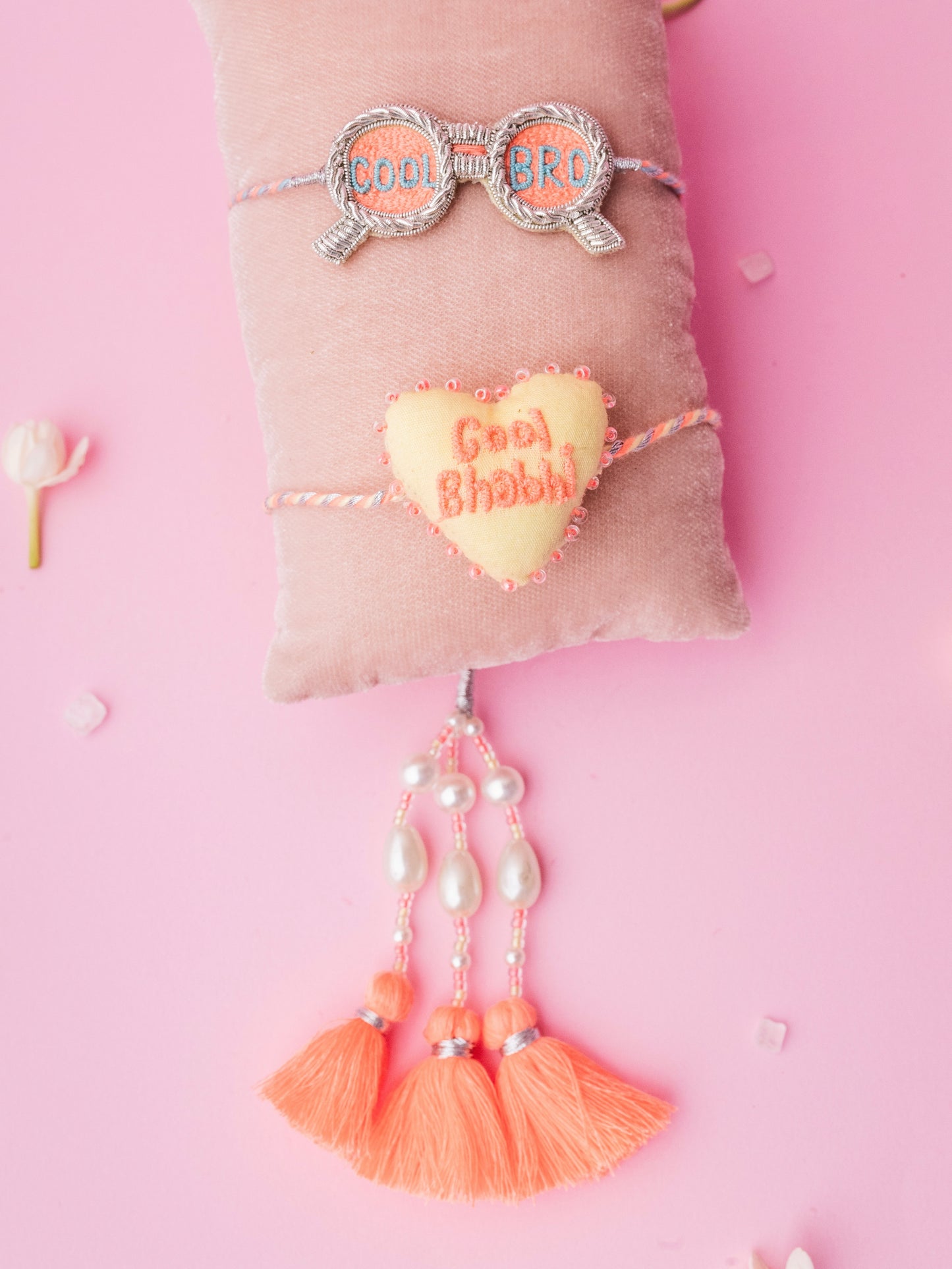 Describe cool bro rakhi and cool bhabhi  lumba combo with tassel and pearl detail