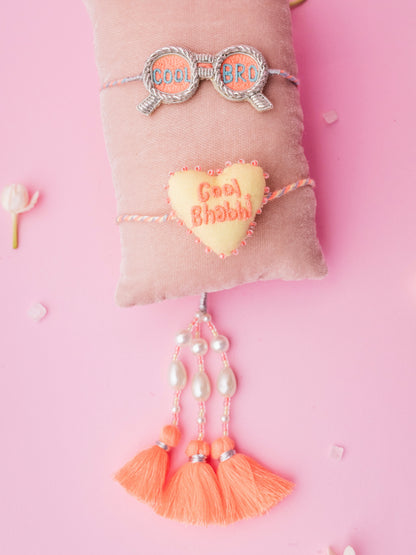Describe cool bro rakhi and cool bhabhi  lumba combo with tassel and pearl detail