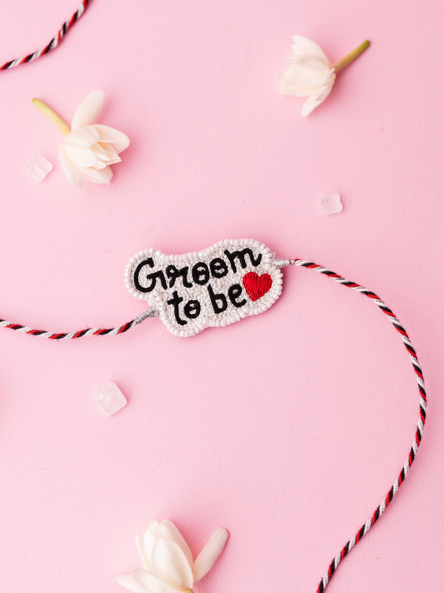 Decorative rakhi with groom to be text