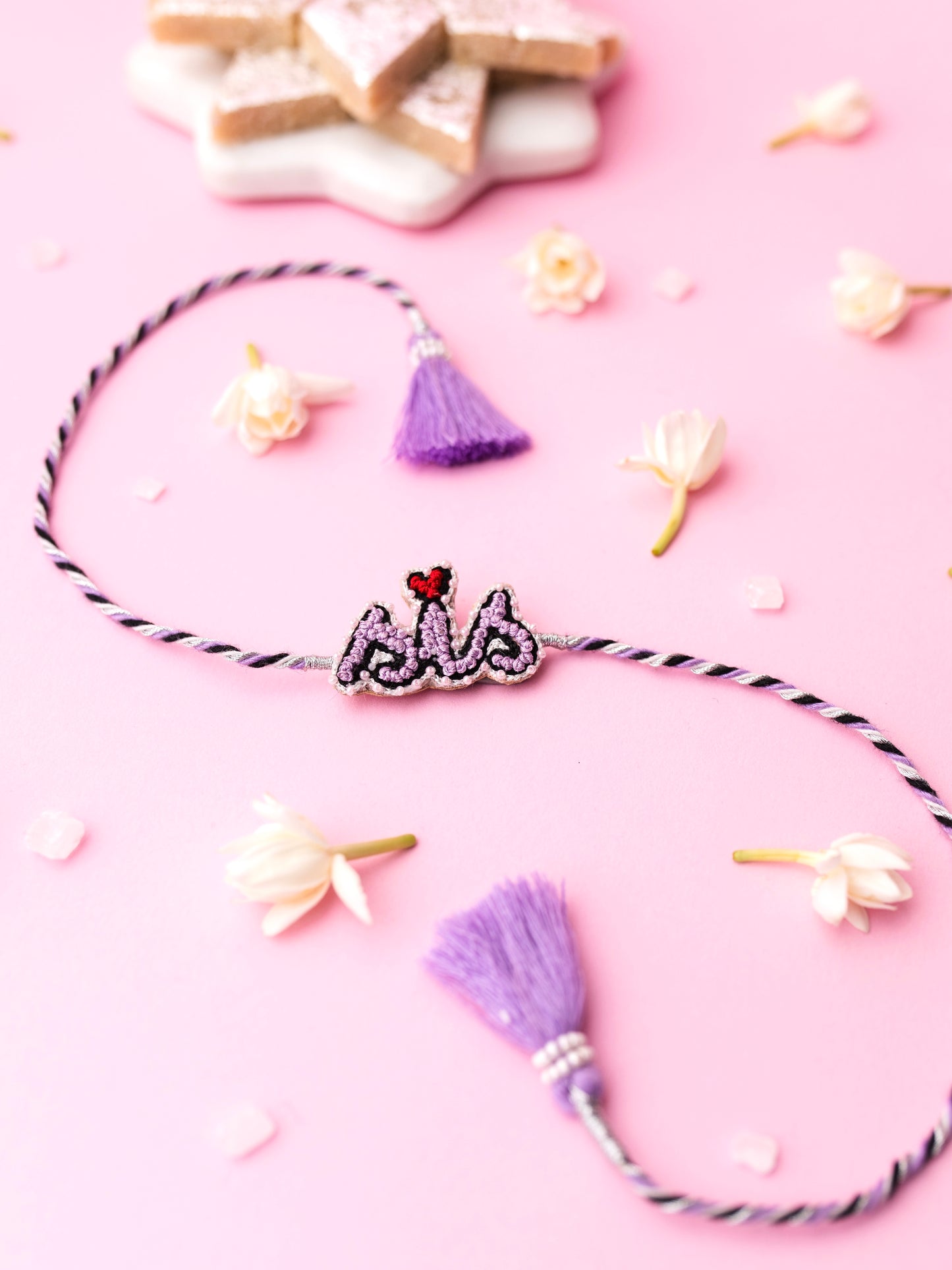 Decorative sister rakhi with  sis text
